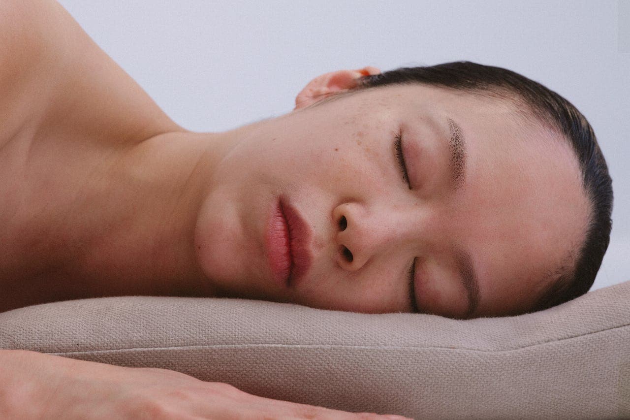 Woman relaxing with eyes closed at a spa
