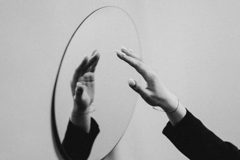mirror and a hand